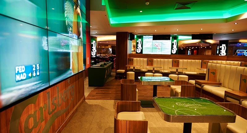 In this picture the inside of Rileys sports bar in London is shown. It is a very smooth and modern sports bar.